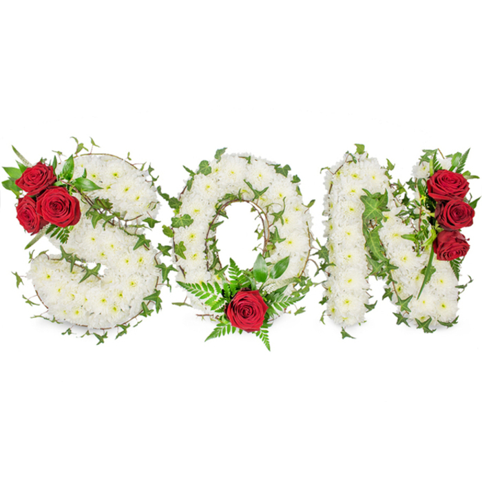 A carefully constructed, deeply moving tribute from East Finchley Flowers presents the letters SON formed entirely from dense clusters of small, pristine white spray chrysanthemums. Each tiny bloom is positioned to create a full, carpeted effect that reads as soft and consoling; the pale heads carry a faint, powdery scent that evokes early daylight. Glossy green ivy is intertwined through the letters, its trailing stems and leaves tracing the shapes and adding vibrant contrast and texture that suggests continuity and remembrance. Poignant spots of colour are introduced through groups of deep red roses: on the S a trio of full roses nestles at the upper left curve with accompanying dark foliage, the O is given a single, centred red rose at its bottom arc surrounded by feathery fern fronds, and the N is accented by another vertical cluster of three red roses on its right side. The red blooms sit dramatically against the white and green, speaking of passion and lasting love. The arrangement is photographed on a clean white background with soft, natural lighting that highlights the design's depth - the tiny chrysanthemum heads, the glossy leaves, and the velvety rose petals. Crafted as a sympathy piece for a son, it offers calm dignity and a tactile, visual expression of grief that families in East Finchley and surrounding N2 neighbourhoods often choose for funerals, graveside services, or memorial displays.