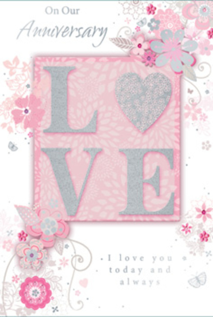 The anniversary card in this image is styled with quiet sophistication, evoking the feeling of receiving a beautifully wrapped bouquet from East Finchley Flowers on a special evening. Dominating the centre is the word LOVE, printed in tall, bold capitals that are distinctly raised from the card's surface, creating a gentle relief under the fingers. Each letter is coated with a fine dusting of glitter that glows softly in pearlescent white and muted blush-pink tones, catching the light like a veil of dewdrops on early-morning petals. The background is a warm, gentle pink, subtly blended to create a velvety sense of depth, as if you are looking at a soft fabric backdrop behind an arrangement of roses. Surrounding the central word, a delicate frame of stylised flowers, leaves, and curling vines sweeps across the card. These botanical motifs are drawn in slim grey lines with hints of soft silver, reminiscent of a florist's graceful design sketch for an anniversary bouquet headed to a home near East Finchley station or a cosy flat off Fortis Green. The blossoms are not heavy or overly detailed; instead they are airy and refined, with fine shading adding just enough dimension to feel alive. Small curls, tendrils, and tiny petals create gentle movement, as though a breeze is stirring the composition. The lighting is soft and even, creating a calm atmosphere where the glitter glows without glare. An elegant script message, written in a flowing, handwritten-style font, offers affectionate anniversary sentiments and a promise of enduring love. Altogether, the card exudes the kind of thoughtful, heartfelt romance you might find in a hand-delivered arrangement, quietly celebrating the shared journey of a couple in East Finchley.